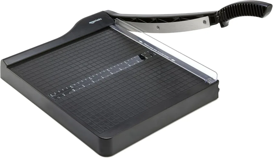 Amazon Basics Paper Cutter — blade lock and half inch grid in a light frame